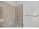 Detail of the updated glass shower featuring tile surround at 6459 Chariot St # 35, Atlanta, GA 30328
