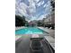 Beautiful community pool with lounge chairs, offering a relaxing and refreshing outdoor space at 6459 Chariot St # 35, Atlanta, GA 30328
