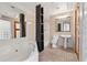 Elegant bathroom featuring a soaking tub, separate shower, and modern fixtures, creating a spa-like retreat at 1023 Riverbend Club Se Dr, Atlanta, GA 30339