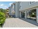 Spacious deck with sliding glass doors, offering seamless indoor-outdoor living and entertaining possibilities at 1023 Riverbend Club Se Dr, Atlanta, GA 30339