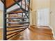 Welcoming foyer featuring a striking spiral staircase and white front door with sidelight at 1023 Riverbend Club Se Dr, Atlanta, GA 30339