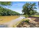 Picturesque river view with lush greenery, providing a serene and natural landscape at 1023 Riverbend Club Se Dr, Atlanta, GA 30339