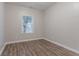 Comfortable room with neutral paint, white trim and durable wood-look flooring at 132 Brownlee Sw Rd, Atlanta, GA 30331
