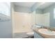 Bathroom with a tub and shower combo and updated vanity at 1377 Mill Lake Cir, Stone Mountain, GA 30088