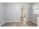 Bright dining room with hardwood floors and large windows for plenty of light at 1377 Mill Lake Cir, Stone Mountain, GA 30088