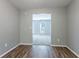 Open floor plan showcasing a living area with hardwood floors and neutral wall paint at 1377 Mill Lake Cir, Stone Mountain, GA 30088