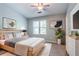 Well-lit bedroom with modern décor, ample natural light, and a comfortable layout at 1377 Mill Lake Cir, Stone Mountain, GA 30088