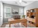 Cozy office with desk, natural light, and book shelf at 1377 Mill Lake Cir, Stone Mountain, GA 30088
