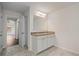 Bathroom with double vanity with granite countertops and undermount sinks at 2090 Beckham St, Cumming, GA 30041