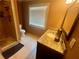 Bathroom featuring tile floors, granite countertops, and a walk-in shower at 2961 River Ridge Drive Sw, Atlanta, GA 30354