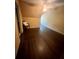 Bedroom with neutral walls, hardwood floors, and a ceiling fan at 2961 River Ridge Drive Sw, Atlanta, GA 30354