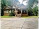 Charming two-story home with a front porch and a wide driveway, perfect for Gathering living at 2961 River Ridge Drive Sw, Atlanta, GA 30354