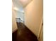 Second story hallway with hardwood floors and access to rooms at 2961 River Ridge Drive Sw, Atlanta, GA 30354