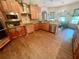 Spacious kitchen featuring custom wood cabinets, granite counters, and stainless steel appliances at 2961 River Ridge Drive Sw, Atlanta, GA 30354