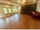 Open living room leading to deck, with tile floors, recessed lights, and ample seating at 2961 River Ridge Drive Sw, Atlanta, GA 30354