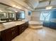 Luxury bathroom with jacuzzi tub, and sinks, and granite countertops at 2961 River Ridge Drive Sw, Atlanta, GA 30354