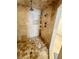 Tile shower stall with multiple shower heads and a corner shelf unit at 2961 River Ridge Drive Sw, Atlanta, GA 30354