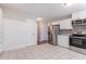 Spacious kitchen with stainless steel appliances and ample storage at 1797 Emerson Lake Cir, Snellville, GA 30078