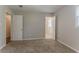 Inviting bedroom features two entry doors and a doorway leading into an ensuite bath at 2783 Bicentennial Dr, Stone Mountain, GA 30087