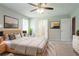 Spacious main bedroom with ample natural light, featuring an ensuite bathroom at 2957 Temple Johnson Rd, Snellville, GA 30039