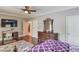 Relaxing bedroom with desk, dresser, walk-in closet and TV at 5040 Fawn Valley Dr, Loganville, GA 30052