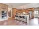 Spacious kitchen featuring an island with seating, stainless steel appliances, and custom wooden cabinetry at 5040 Fawn Valley Dr, Loganville, GA 30052