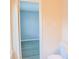View from bathroom, showcasing the toilet and adjacent bedroom with modern flooring at 130 Mimosa Dr, Fayetteville, GA 30214