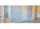 Bright bedroom featuring gray walls, white trim and light-colored wood-look flooring at 130 Mimosa Dr, Fayetteville, GA 30214