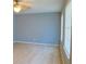 Bedroom with neutral walls, ceiling fan, and bright natural light at 130 Mimosa Dr, Fayetteville, GA 30214