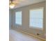 Bedroom with neutral walls, ceiling fan, and windows dressed with blinds at 130 Mimosa Dr, Fayetteville, GA 30214