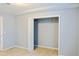 Bedroom closet with open door showing hanging bar and storage space at 130 Mimosa Dr, Fayetteville, GA 30214