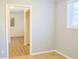 Neutral room with white trim and an open doorway leading to another room at 130 Mimosa Dr, Fayetteville, GA 30214