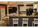 Lovely kitchen featuring a breakfast bar and modern stainless steel appliances at 1473 Wildwood Way, Hampton, GA 30228