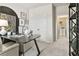 Office area features a modern desk, a picture frame wall, and a view into the laundry room at 55 Peeples Dr, Lawrenceville, GA 30046