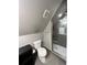 Renovated bathroom with dark tiles, glass shower, and modern fixtures at 782 Myrtle Ne St # B, Atlanta, GA 30308