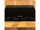Close-up of the modern induction cooktop featured on the kitchen counter at 782 Myrtle Ne St # B, Atlanta, GA 30308