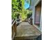 Exterior deck leads to the entrance with wooden railing at 782 Myrtle Ne St # B, Atlanta, GA 30308