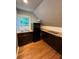 Kitchenette equipped with dark cabinets, a mini fridge, and butcher block countertop at 782 Myrtle Ne St # B, Atlanta, GA 30308