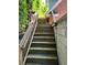 Exterior staircase with wooden rails leading to the entrance of the building at 782 Myrtle Ne St # B, Atlanta, GA 30308