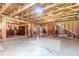 Unfinished basement with exposed wooden beams and potential for customization at 2010 Bennett Rd, Grayson, GA 30017