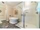 Bathroom featuring a frameless glass shower and separate soaking tub, providing a spa-like experience at 2010 Bennett Rd, Grayson, GA 30017