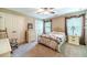 Cozy bedroom with neutral tones, double closets, and comfortable furnishings, a peaceful retreat at 2010 Bennett Rd, Grayson, GA 30017