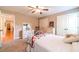 Bright bedroom with double closets, and soft carpeting, creating a warm and inviting space at 2010 Bennett Rd, Grayson, GA 30017