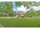 Beautiful home exterior featuring manicured landscaping and a stone facade at 2010 Bennett Rd, Grayson, GA 30017