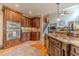 Spacious kitchen boasting stainless appliances, custom cabinets, hardwood floors, and access to living areas at 2010 Bennett Rd, Grayson, GA 30017