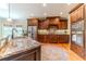 Gourmet kitchen boasting granite countertops, stainless steel appliances, and custom wood cabinetry at 2010 Bennett Rd, Grayson, GA 30017