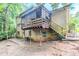 The backyard features a porch, brick exterior, and fenced-in yard at 2116 Twin Falls Rd, Decatur, GA 30032