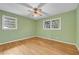 Bedroom with hardwood floors and ceiling fan at 3746 Gladney Dr, Atlanta, GA 30341