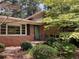 Charming brick home with well-maintained landscaping, enhancing its curb appeal at 3746 Gladney Dr, Atlanta, GA 30341