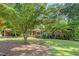 Charming brick home featuring lush landscaping and a spacious, well-maintained front yard at 3746 Gladney Dr, Atlanta, GA 30341